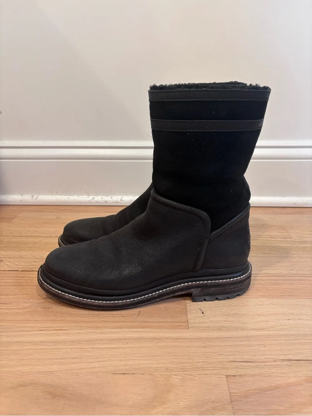 CHANEL black leather & suede boots with an embossed CC logo on heel size 37